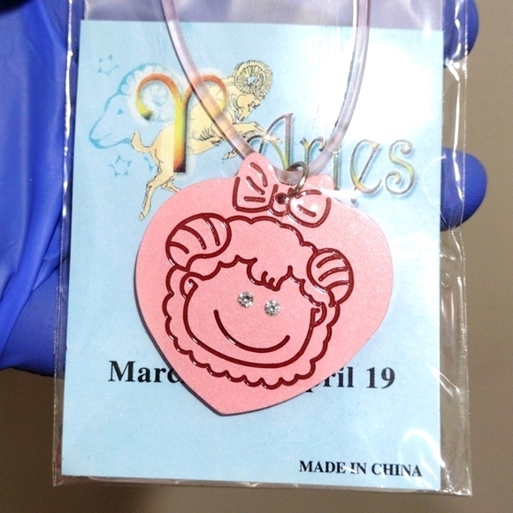 The Ram (Aries) March 21– April 19 Pink Zodiac Pendant Rubber Cord Necklace - Picture 1 of 5